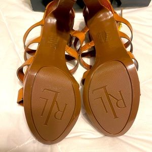 Polo Tan beautiful high heel with gold accents. Worn only once.